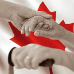 Hands holding in front of a Canadian flag
